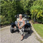 I have an native English language and I am willing to dedicate my time to help others achieve their goals